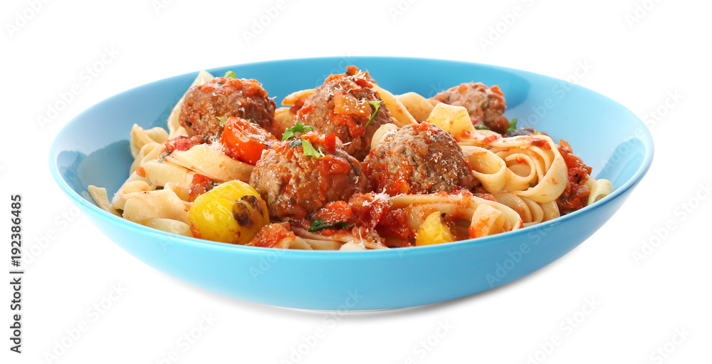 Delicious pasta with meat balls and tomato sauce in plate on white background Delicious pasta with meat balls and tomato sauce in plate on white background