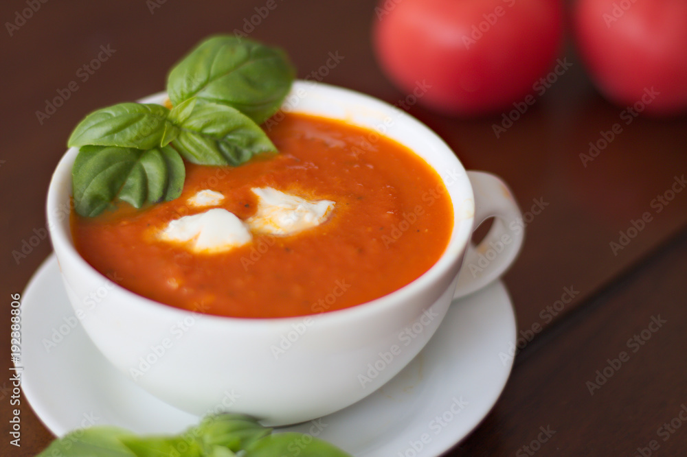 Creamy tomato soup with mozzarella and basil Creamy tomato soup with mozzarella and basil