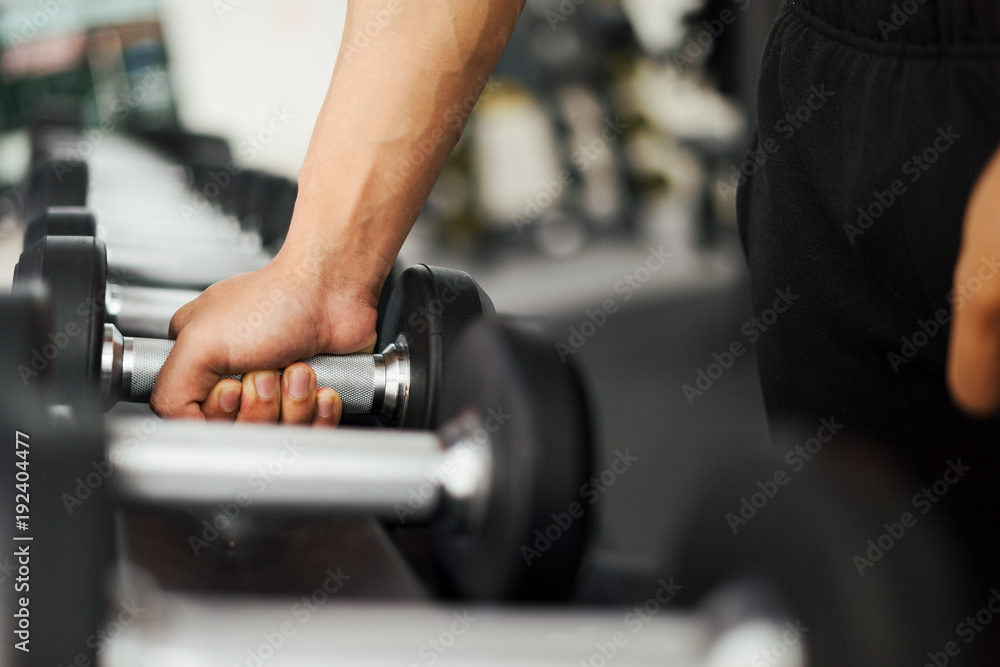 strong fitness man posing muscular body and doing exercises for bodybuilder in the gym, fitness concept, sport concept strong fitness man posing muscular body and doing exercises for bodybuilder in the gym, fitness concept, sport concept