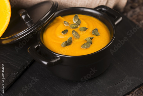 Pumpkin and carrot soup with seeds
