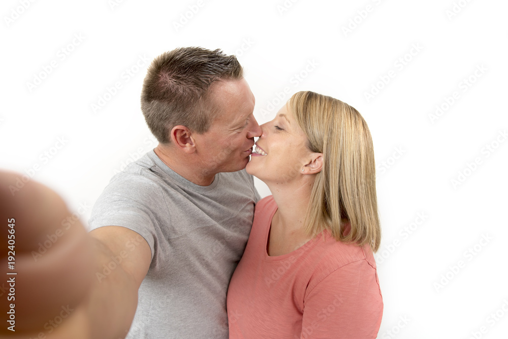 young beautiful happy and attractive romantic couple with husband and wife or girlfriend and boyfriend taking selfie self portrait photo young beautiful happy and attractive romantic couple with husband and wife or girlfriend and boyfriend taking selfie self portrait photo