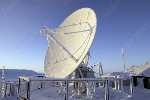 Antenna against the winter landscape in Arctic