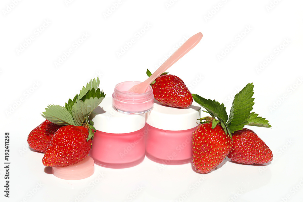 Facial mask with strawberry extract. strawberry mask in a glass bottle and berries fresh ripe strawberries on a white background. Organic Botanical Cosmetics Facial mask with strawberry extract. strawberry mask in a glass bottle and berries fresh ripe strawberries on a white background. Organic Botanical Cosmetics