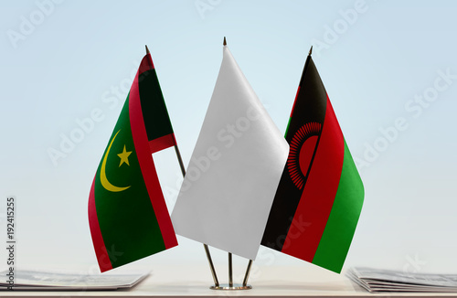 Flags of Mauritania and Malawi with a white flag in the middle