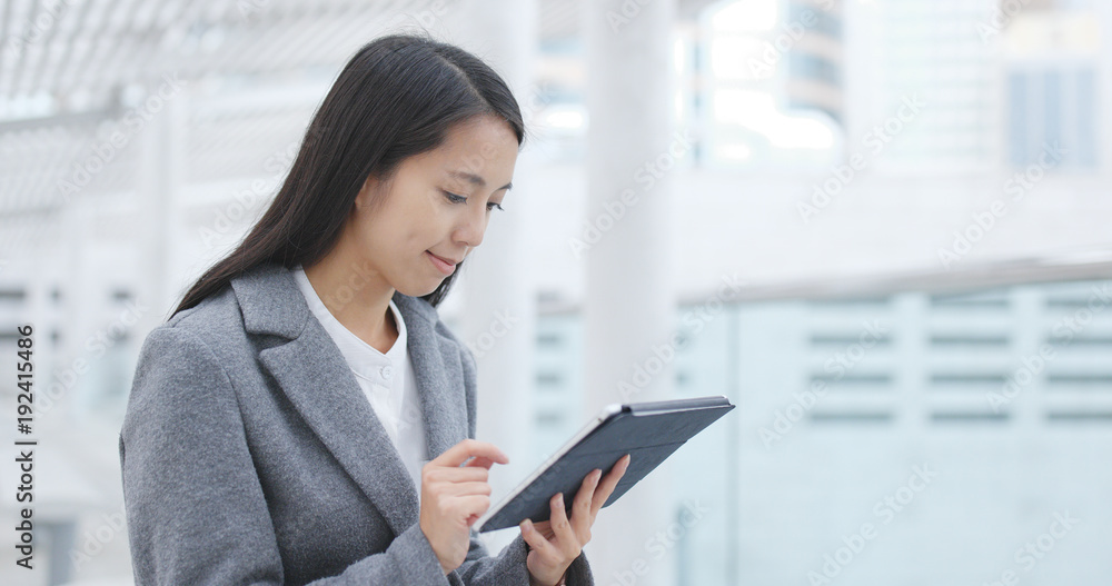 Businesswoman work on tablet