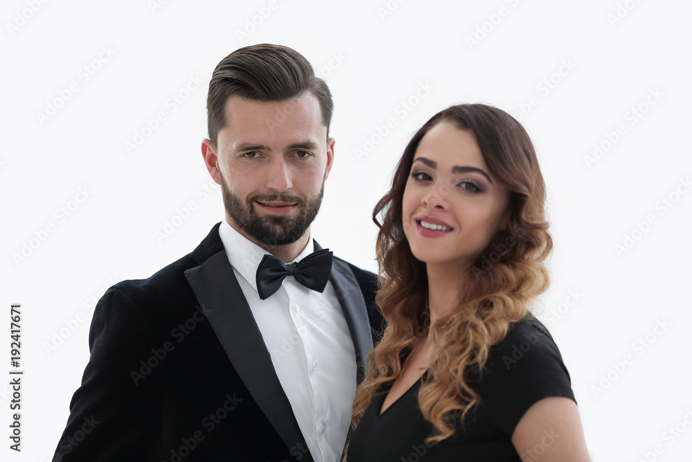 Portrait of a handsome man looking at the camera with a woman Portrait of a handsome man looking at the camera with a woman