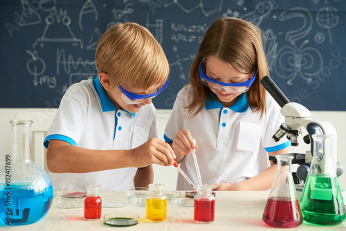 Children working in laboratory