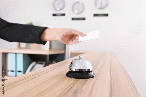 Female receptionist with ca...