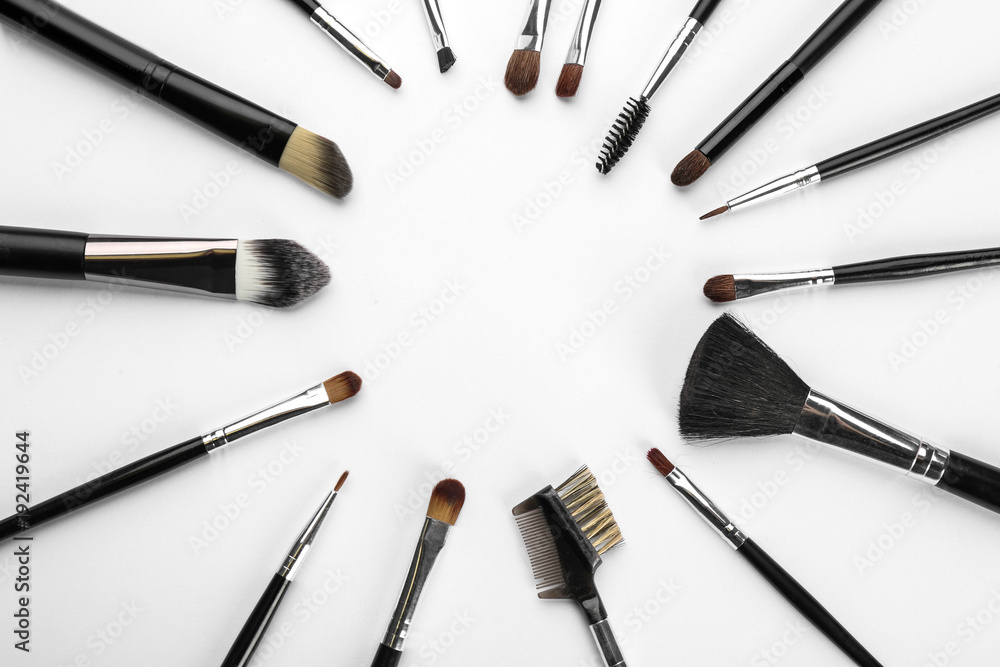 Different brushes of professional makeup artist on white background Different brushes of professional makeup artist on white background