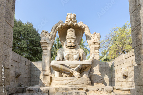 sculpture of Narasimha monolith carved in-situ  Hampi  Karnataka  India