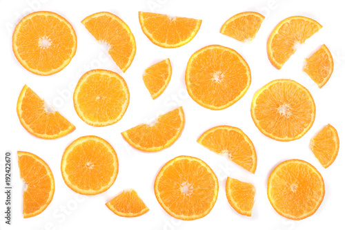 Slices of orange or tangerine isolated on white background. Flat lay, top view. Fruit composition