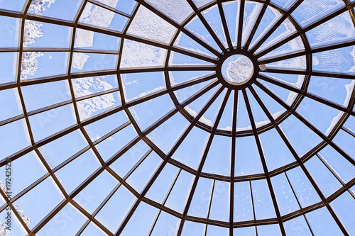 Round glass roof. Modern architecture. Blue color