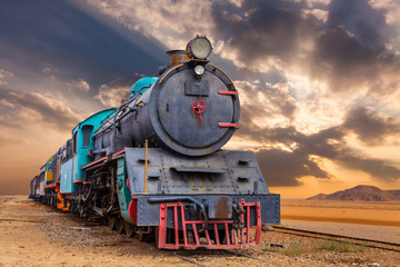 Fotobehang Trein Locomotief door woestijn Wadi Rum  © Anton Petrus