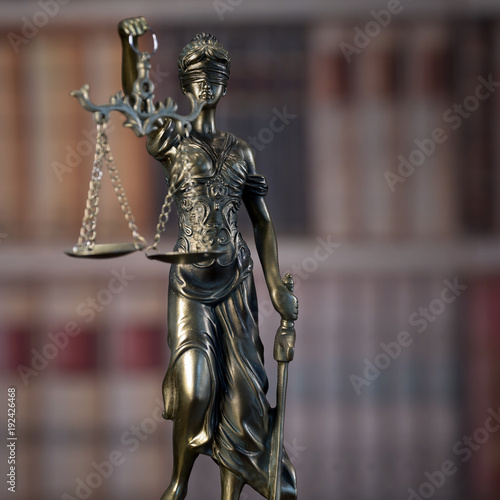 Law and Justice concept. Law books on background