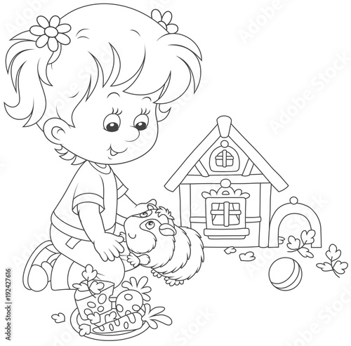 Little girl playing with her pet cavy