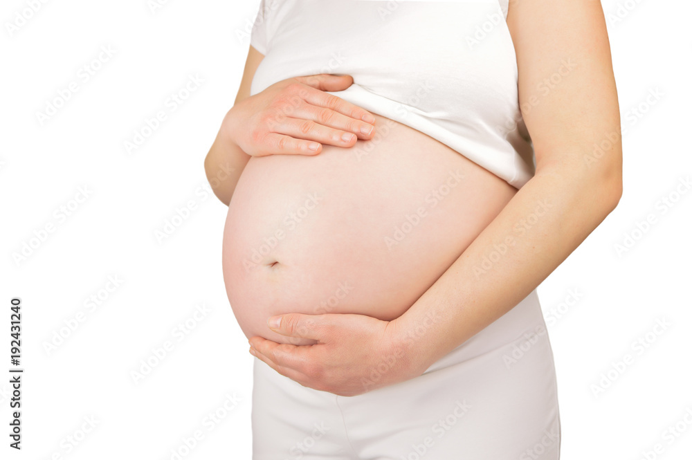 woman holding her pregnant belly woman holding her pregnant belly