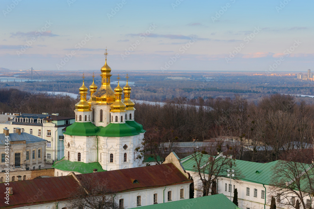 Kyiv landscape with Kiev Pechersk Lavra church on Dnieper river background.