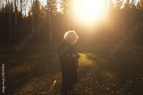 Woman in sunlight in Sweden photo