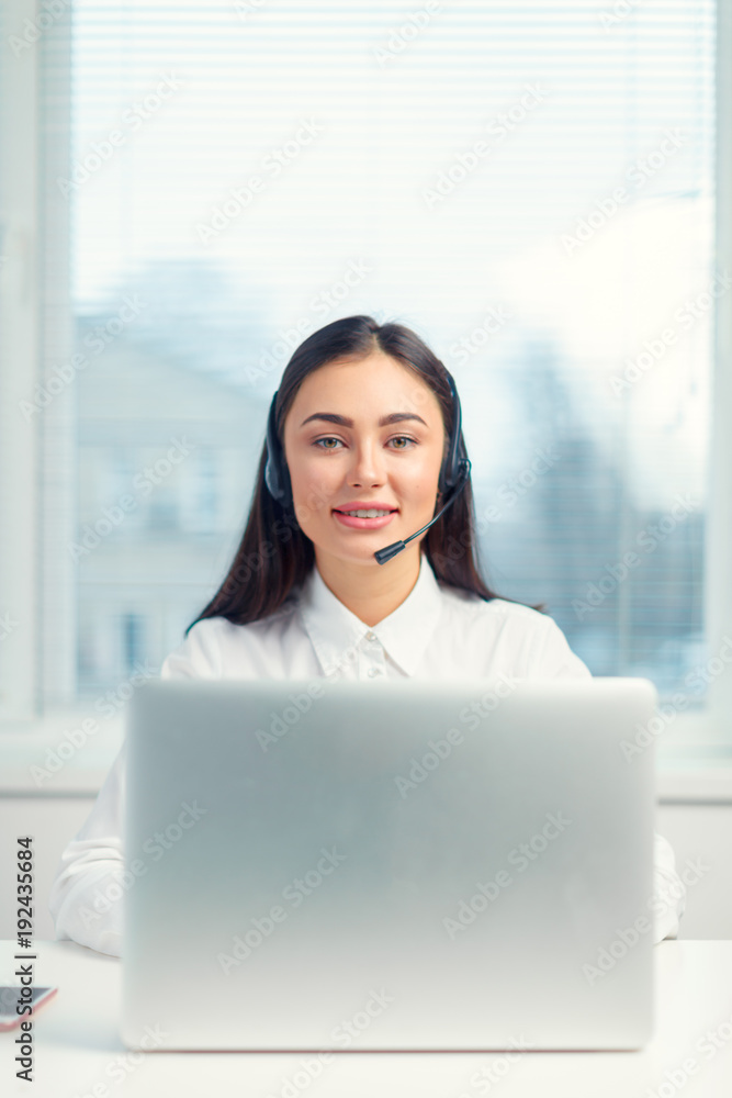 Support phone operator in headset at workplace Support phone operator in headset at workplace