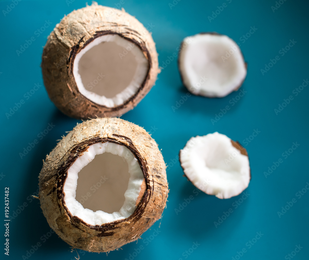 Coconut on blue color background Coconut on blue color background