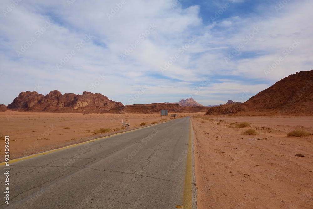 Desert road leading to Jordanian Wadi Rum, Jordan, Middle East Desert road leading to Jordanian Wadi Rum, Jordan, Middle East