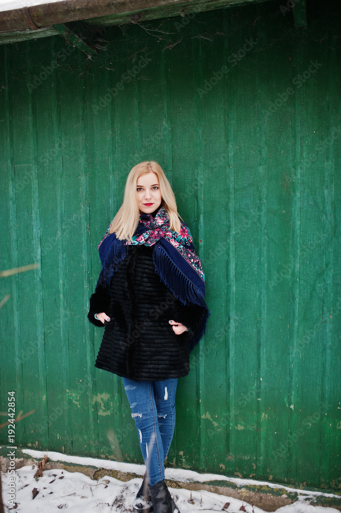 Blonde girl with hand embroidered scarf posed at winter day. Women's handkerchief. Blonde girl with hand embroidered scarf posed at winter day. Women's handkerchief.