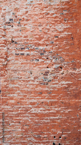 Old worn broken brick wall texture background