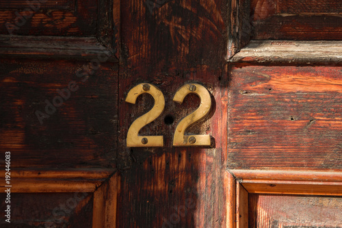 House number 22 on the wooden door photo