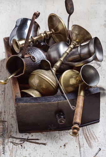  Set of kitchen utensils and household items made of metal on white background.