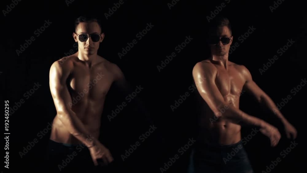 Two funny guys on a black background Two funny guys on a black background