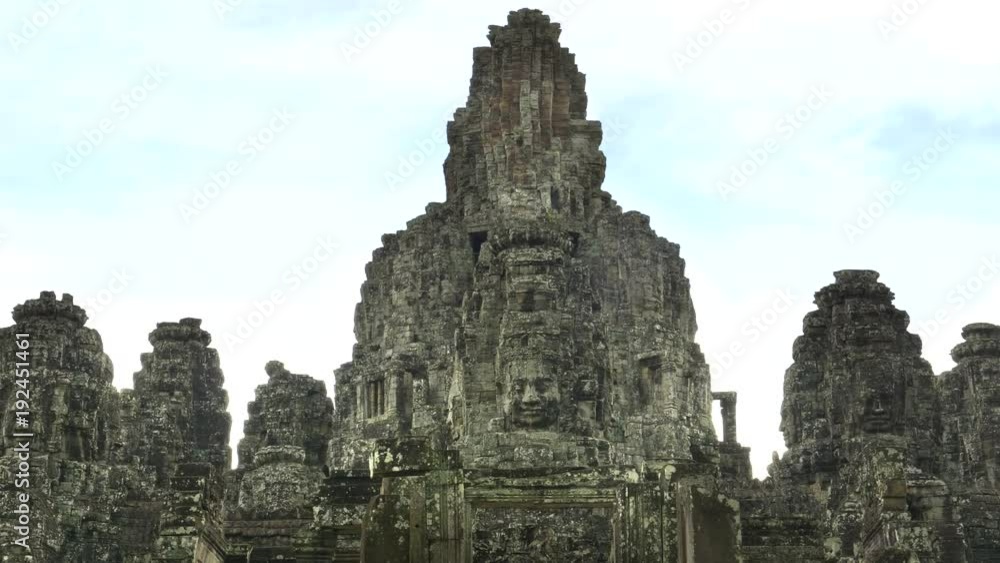 zoom in on a face tower at bayon temple near angkor wat, cambodia zoom in on a face tower at bayon temple near angkor wat, cambodia