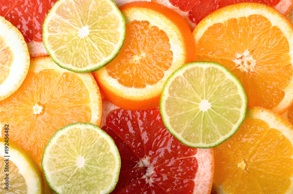 Fresh citrus slices as background pattern Fresh citrus slices as background pattern