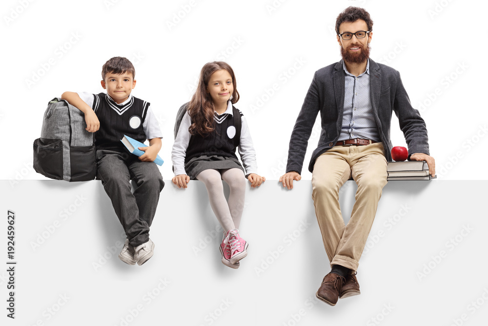 Schoolboy, schoolgirl and a teacher sitting on a panel