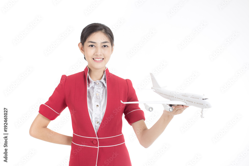 Portrait of Asian Air Hostess holding airplane model and passport with White background, Woman stand and smile at isolated on white background, Woman with Air Hostess concept. Portrait of Asian Air Hostess holding airplane model and passport with White background, Woman stand and smile at isolated on white background, Woman with Air Hostess concept.