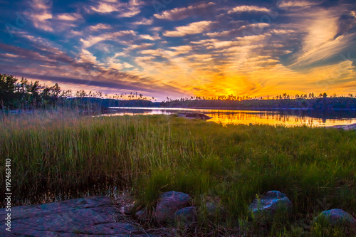 Sunset over the lake. Summe...