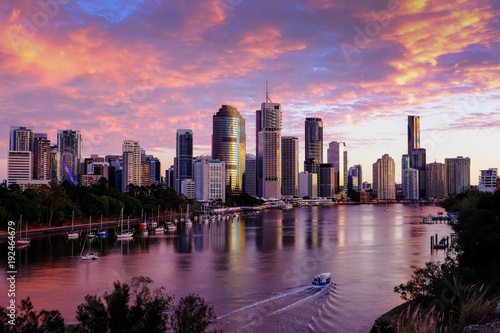 View of Brisbane city and Brisbane River early in the morning with pink clouds photo