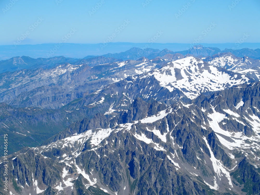 Alpine mountains range landscapes seen from Aiguille du Midi