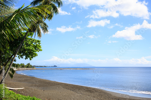 Fototapeta Black sand on beach at Tahiti PAPEETE, FRENCH POLYNESIA.