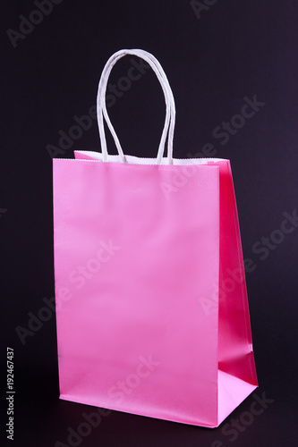 Colour shopping bags on black background