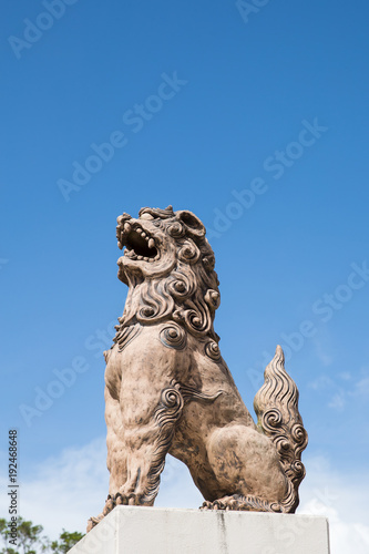 Lion statue with sky and cloud