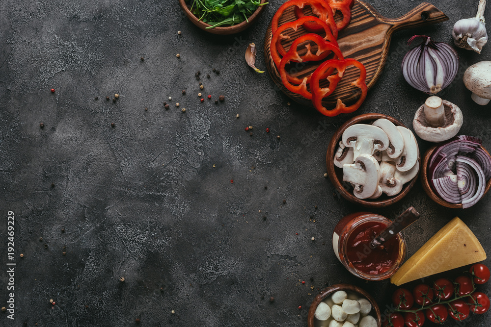 Αυτοκόλλητο top view of raw pizza ingredients on concrete table