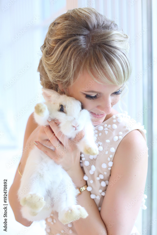 beautiful bride with a rabbit in his hands beautiful bride with a rabbit in his hands