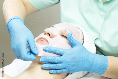 Massage and facial peels at the salon using cosmetics 