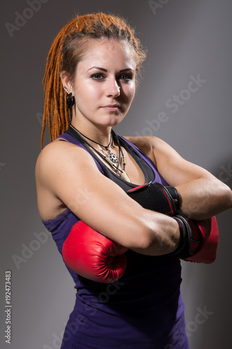 Young woman boxer with dreadlocks © kanzefar
