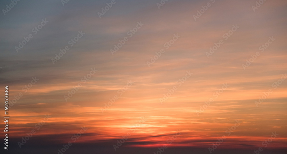 Beautiful colorful sunrise with clouds in the red sky