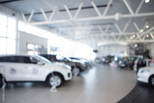 Car sales, market place, blurry photo