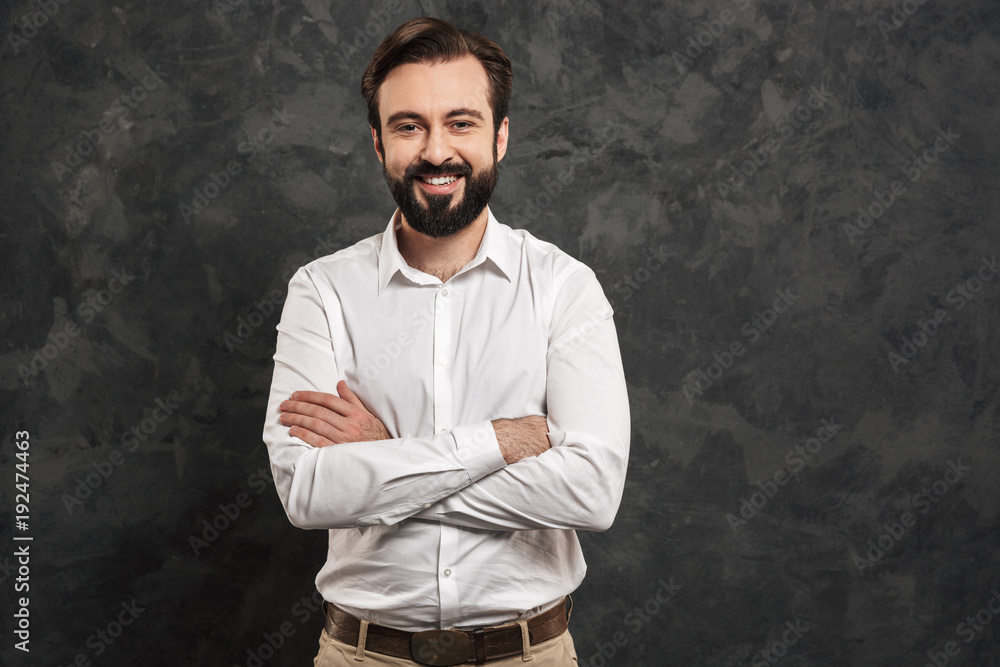 Portrait of a confident young man dressed white shirt