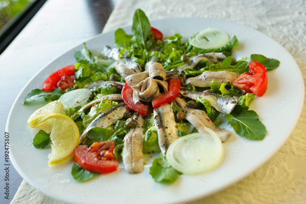 Anchovies served on a plate, konoba, Croatia. Anchovies served on a plate, konoba, Croatia.