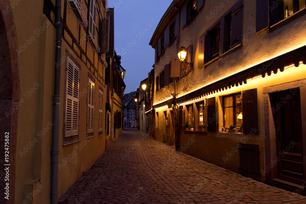 Illuminated alley in Colmar, France