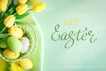 Happy Easter. Congratulatory easter background. Easter eggs and flowers.